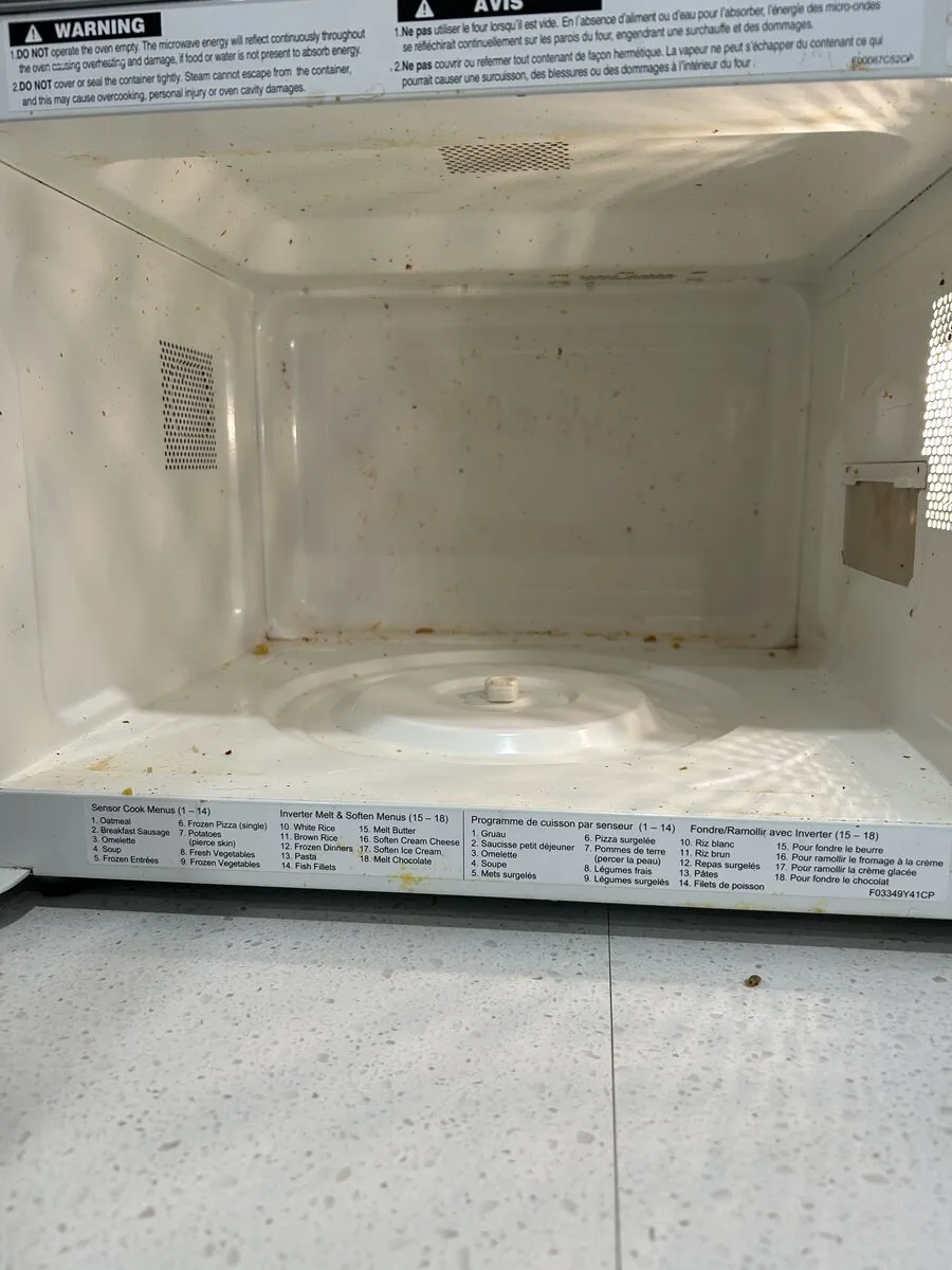 Dirty microwave before cleaning