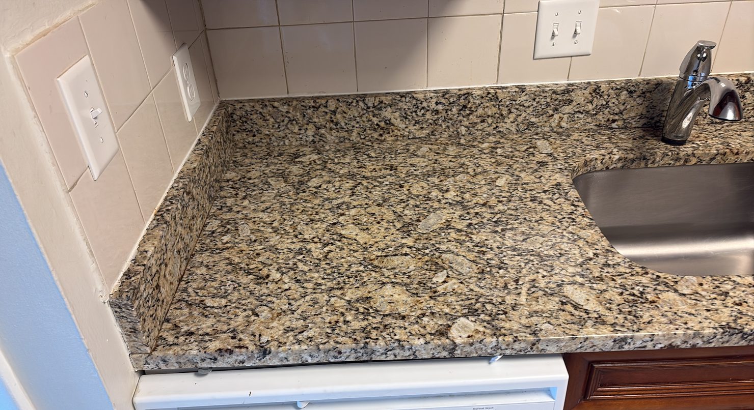 Clean kitchen counters and backsplash included in a Columbus standard clean